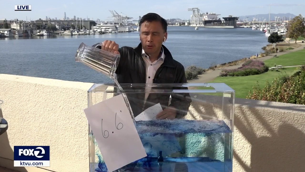 Meteorologist Mark Tamayo explaining king tides and Kelvin waves to Bay Area residents